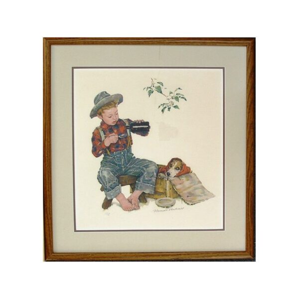 A boy with a dog, framed.